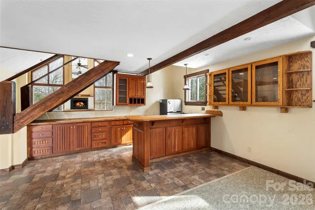 a view of a balcony with wooden floor