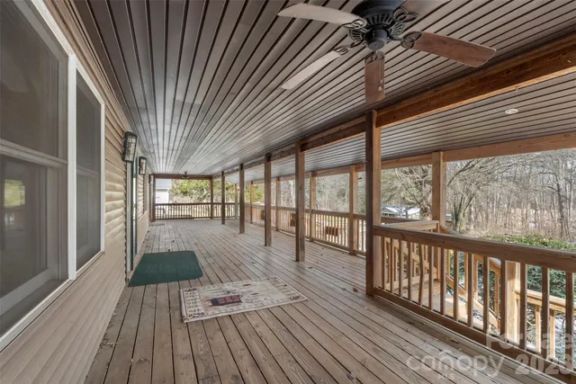 a kitchen with stainless steel appliances granite countertop a sink and a refrigerator