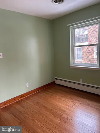 a view of a bathroom with a sink and a window