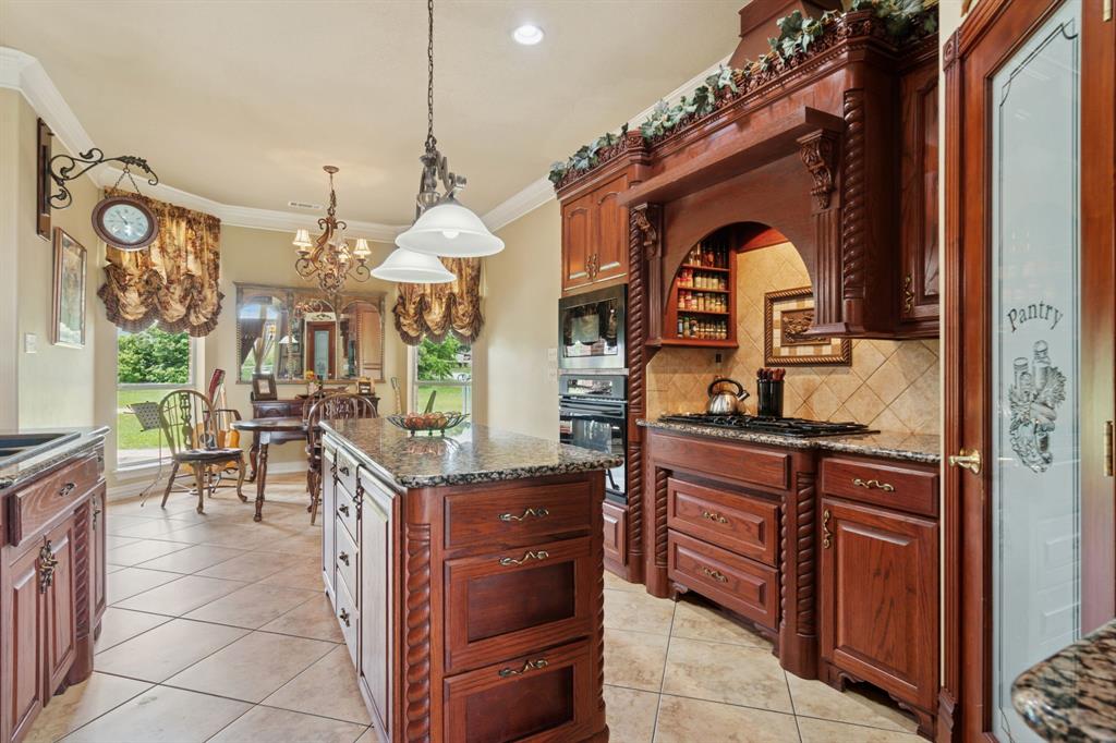 2308 Kella Court Haslet, TX 76052 - Photo 11 of 40 a kitchen with a sink and cabinets