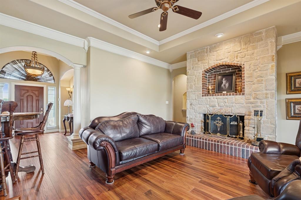 2308 Kella Court Haslet, TX 76052 - Photo 15 of 40 a living room with furniture and a fireplace