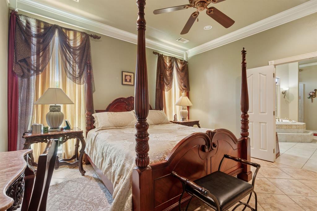 2308 Kella Court Haslet, TX 76052 - Photo 18 of 40 a bedroom with a bed and wooden floor