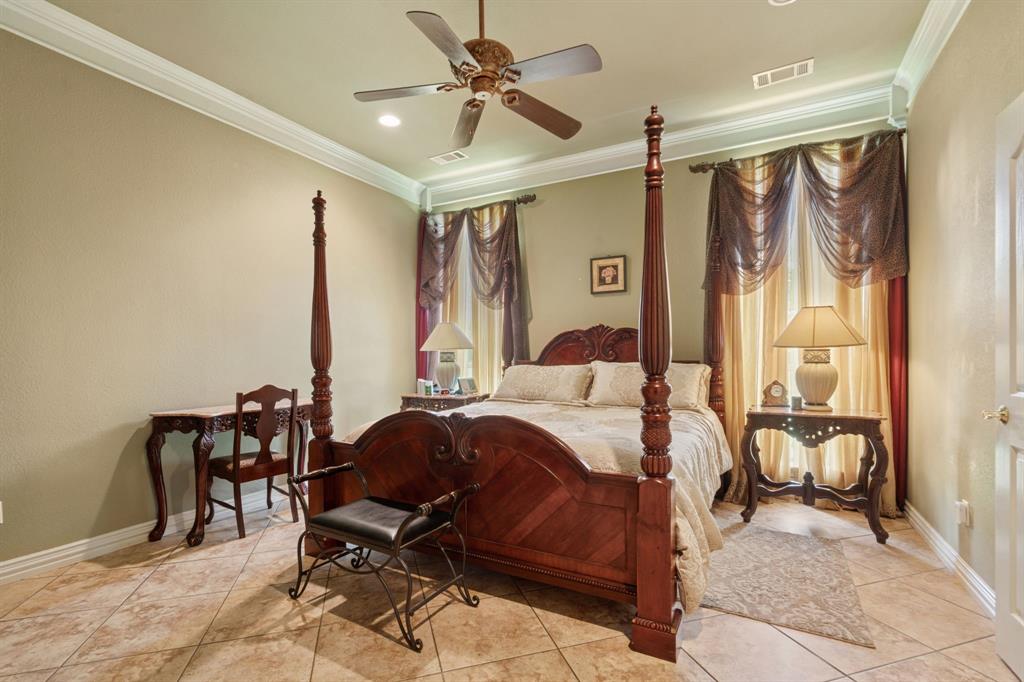 2308 Kella Court Haslet, TX 76052 - Photo 19 of 40 a bed room with a bed and a chair