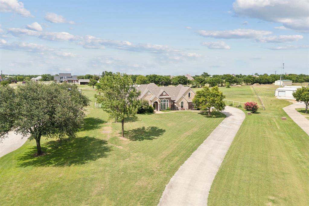 2308 Kella Court Haslet, TX 76052 - Photo 2 of 40 a view of a lake with a houses