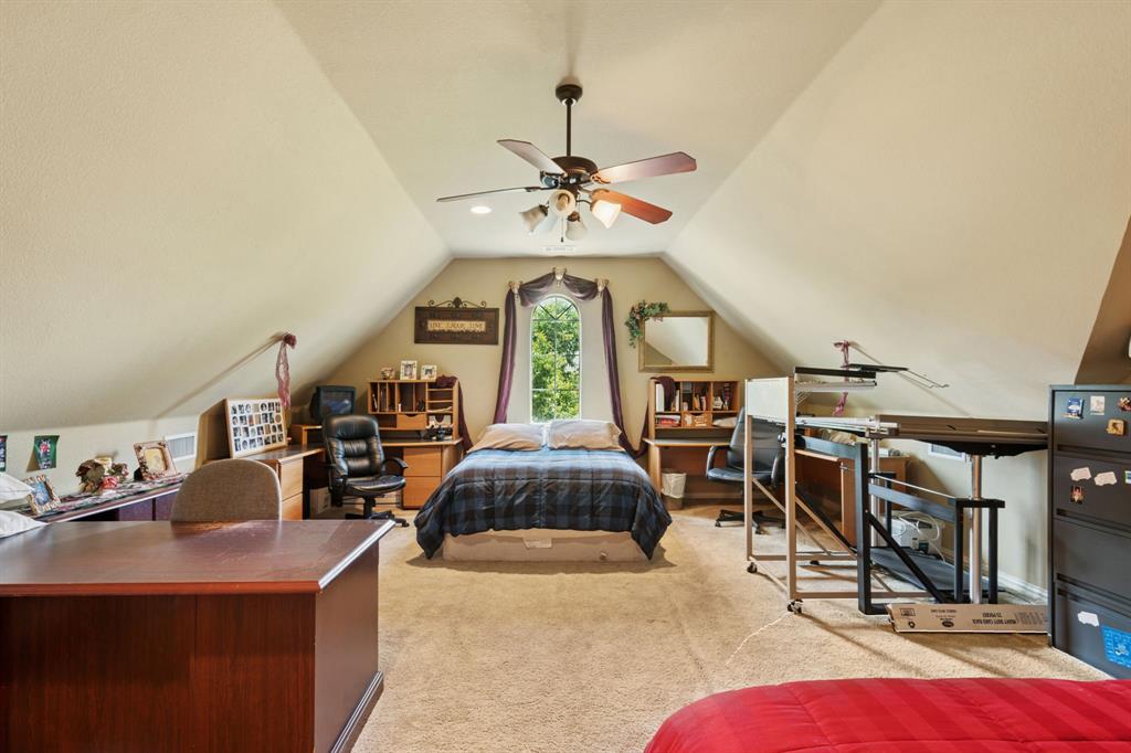 2308 Kella Court Haslet, TX 76052 - Photo 31 of 40 a living room with furniture a chandelier and a chandelier