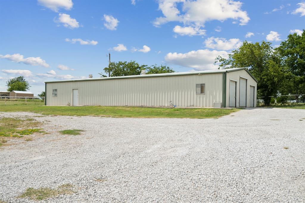 2308 Kella Court Haslet, TX 76052 - Photo 36 of 40 a view of a swimming pool with an outdoor space and seating area