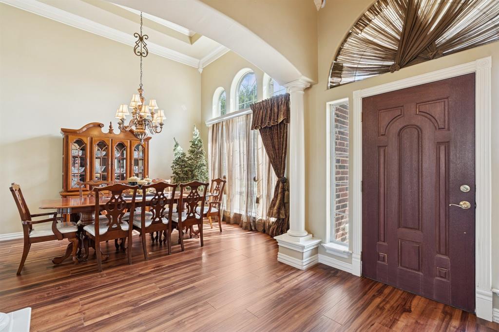 2308 Kella Court Haslet, TX 76052 - Photo 7 of 40 a view of a dining room with furniture and wooden floor
