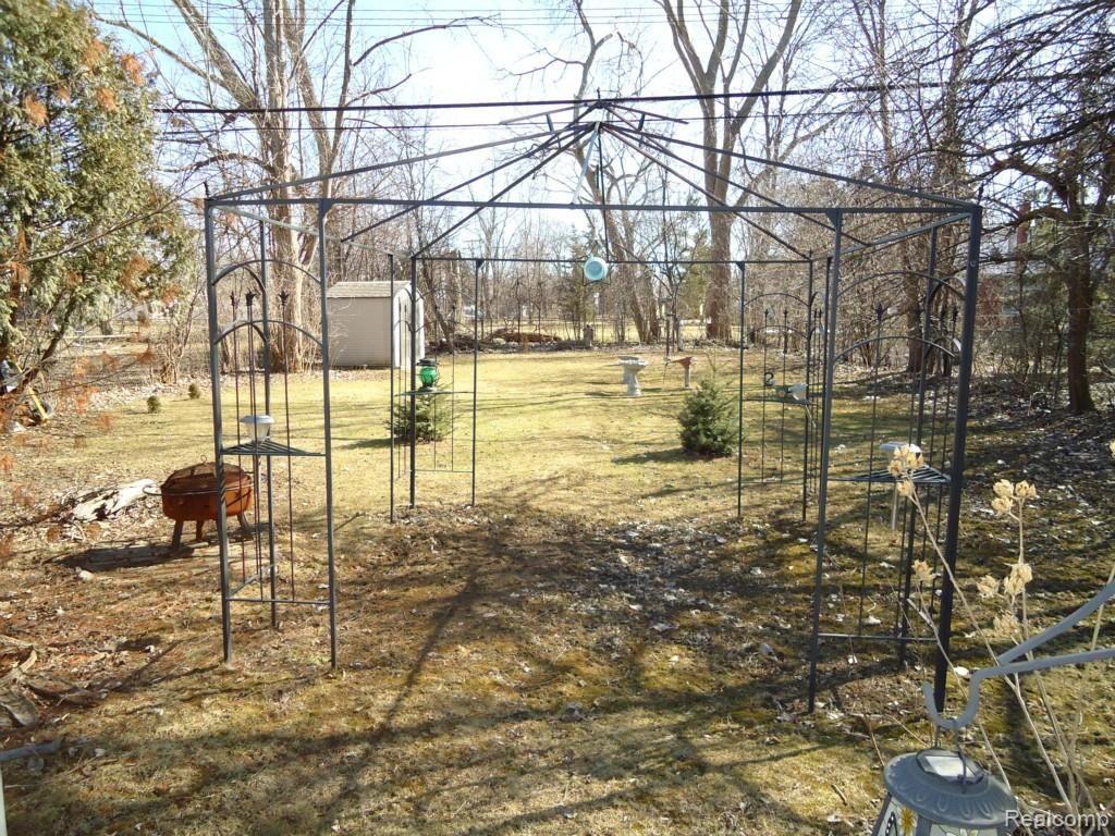 14759 Pennsylvania Road Riverview, MI 48193 - Photo 5 of 25 LARGE PRIVATE BACKYARD WITH LOTS OF TREES AND A NEW SHED