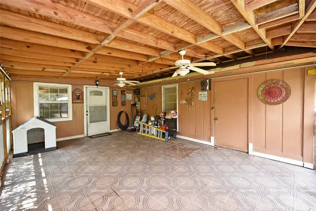 a view of backyard with porch