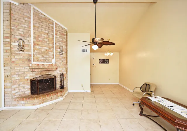 a view of a livingroom with a fireplace
