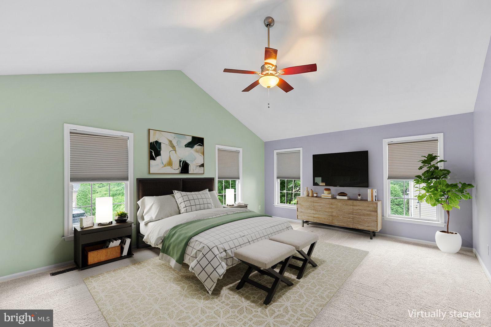 104 Constitution Terrace Elkton, MD 21921 - Photo 12 of 20 a bedroom with a bed and a flat screen tv