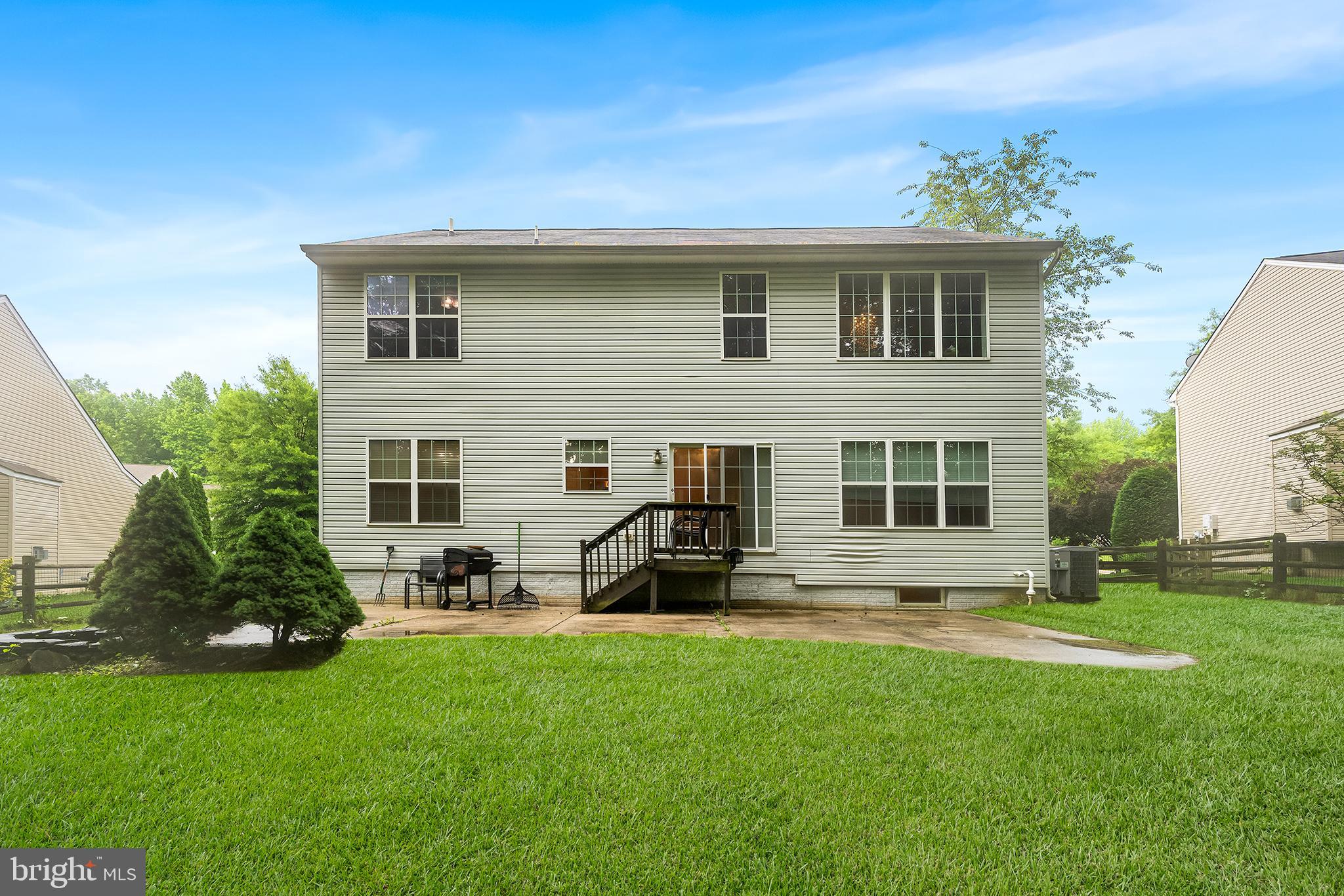 104 Constitution Terrace Elkton, MD 21921 - Photo 18 of 20 a backyard of a house with table and chairs
