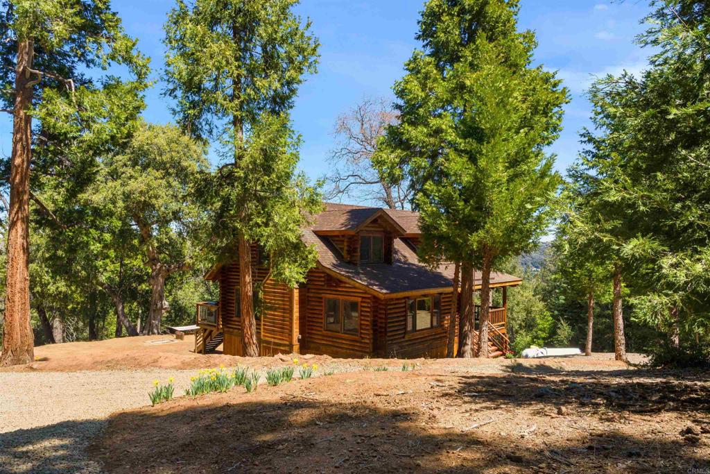 33480 Bailey Meadow Road Palomar Mountain, CA 92060 - Photo 42 of 51 a front view of a house with a yard
