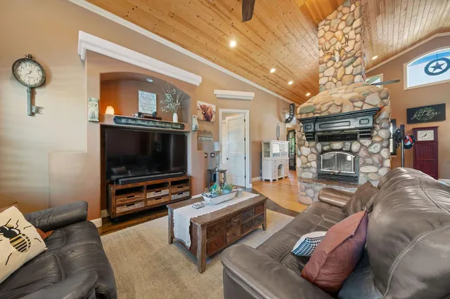 a kitchen with stainless steel appliances granite countertop a sink and cabinets