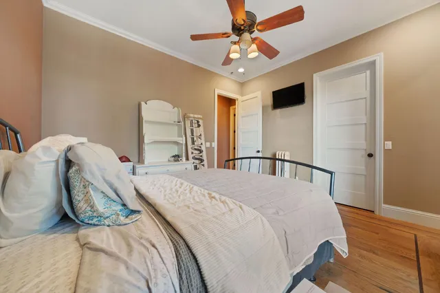 a bed room with furniture and a window