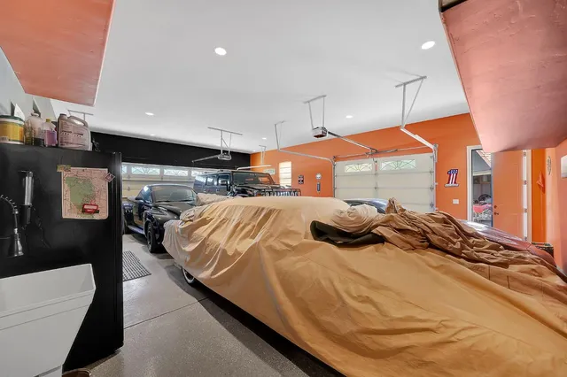 a view of a chairs and table in the balcony