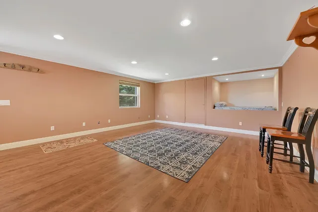 a view of parking garage with cars