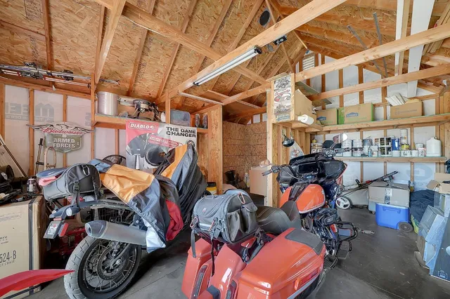 a view of outdoor sitting area with furniture and backyard