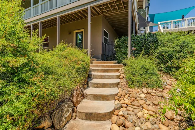 an aerial view of house with swimming pool