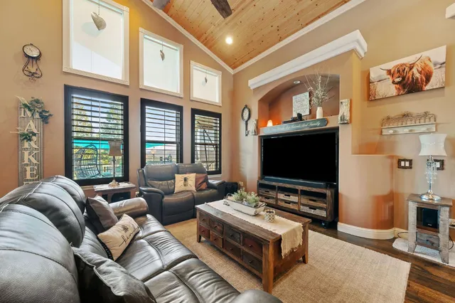 a kitchen with stainless steel appliances granite countertop a sink and cabinets
