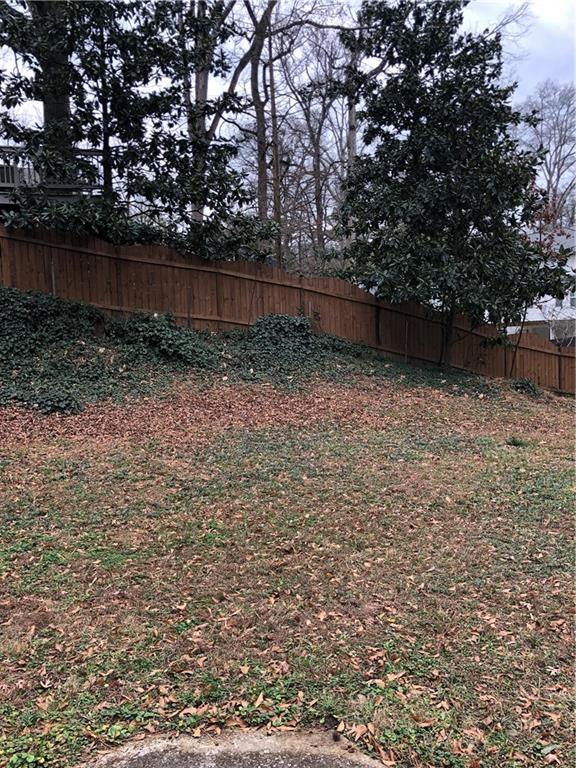 1048 Mantissa Street Northwest Atlanta, GA 30318 - Photo 11 of 12 a backyard of a house