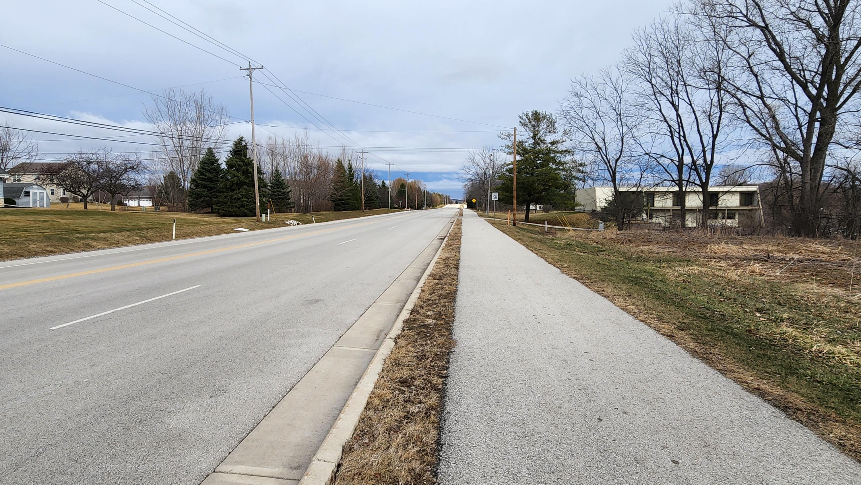 Lt1 Duplainville Road Pewaukee, WI 53072 - Photo 2 of 13 Road and Walkway complete North view