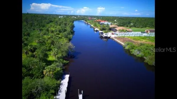 a view of a lake from a yard