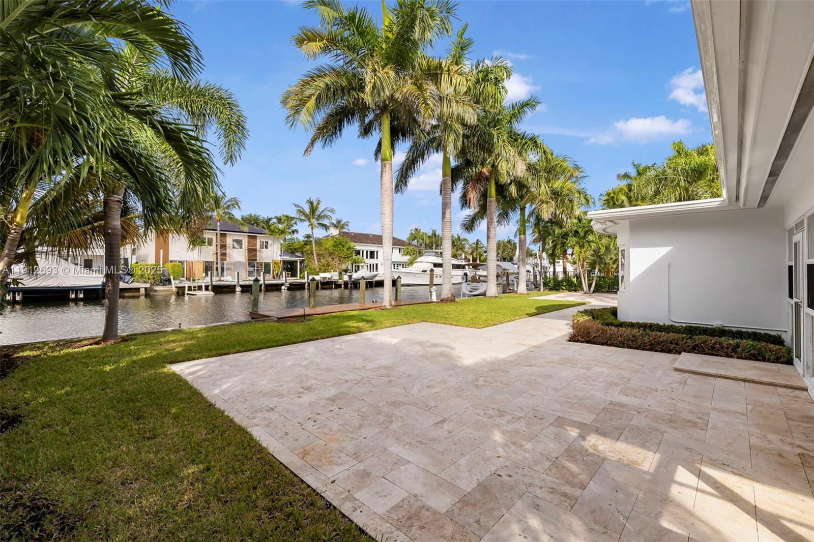 633 Solar Isle Drive Fort Lauderdale, FL 33301 - Photo 14 of 57 a view of outdoor space with swimming pool and lounge chair