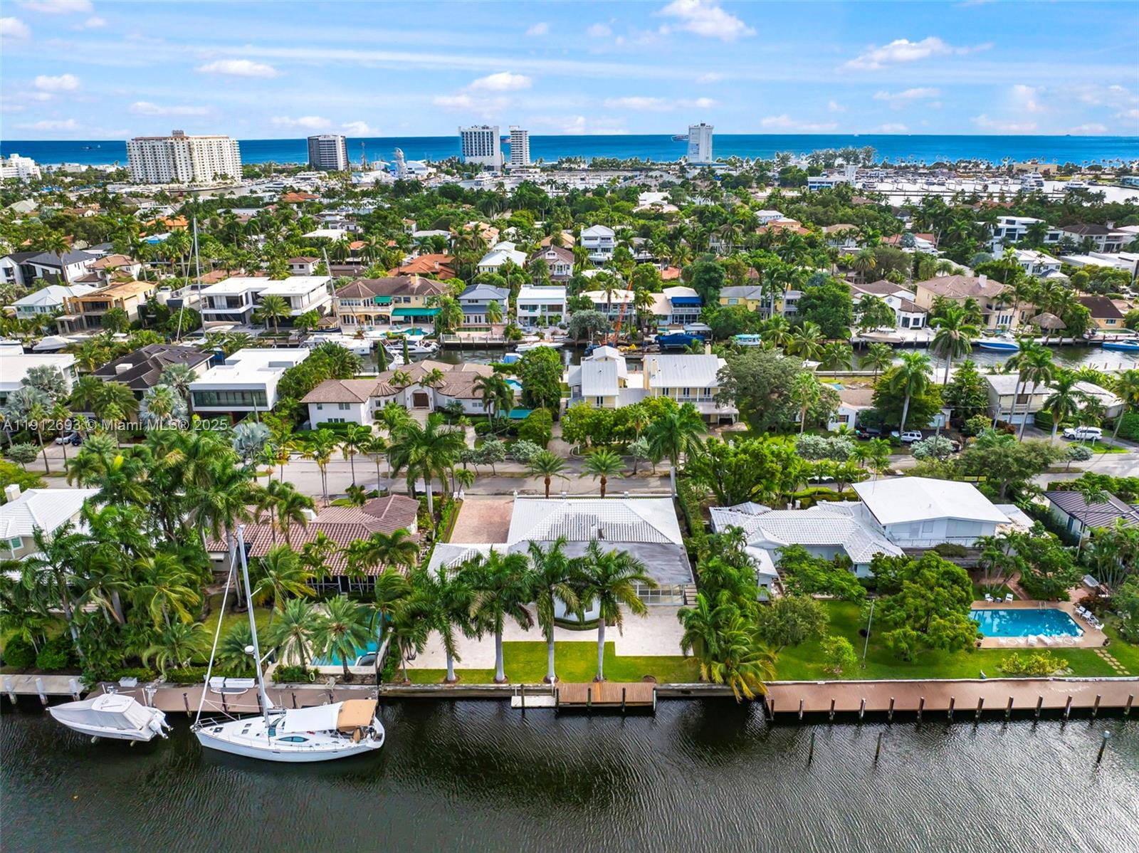 633 Solar Isle Drive Fort Lauderdale, FL 33301 - Photo 3 of 57 a view of a city with swimming pool
