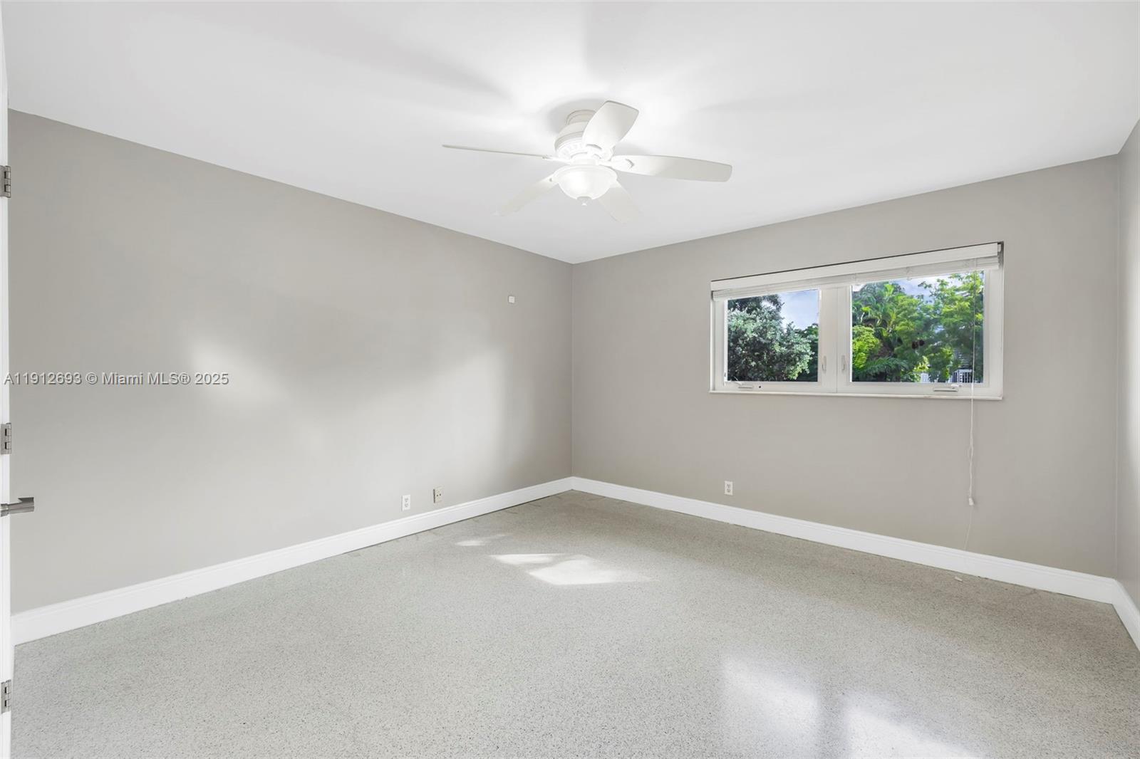 633 Solar Isle Drive Fort Lauderdale, FL 33301 - Photo 37 of 57 a view of an empty room with a window