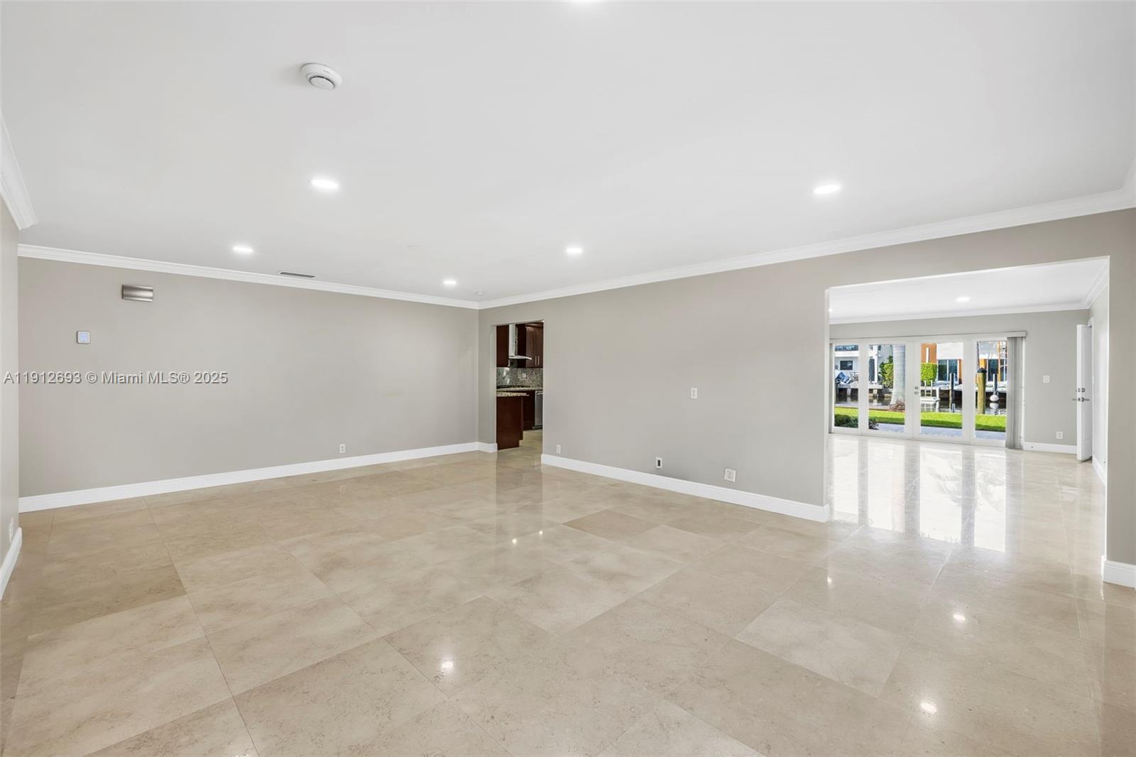 633 Solar Isle Drive Fort Lauderdale, FL 33301 - Photo 45 of 57 a view of an empty room with a window