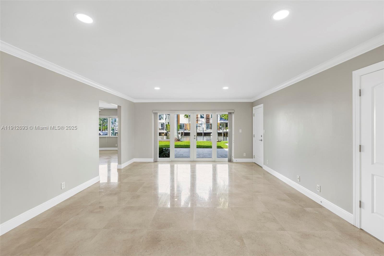 633 Solar Isle Drive Fort Lauderdale, FL 33301 - Photo 51 of 57 a view of an empty room with window