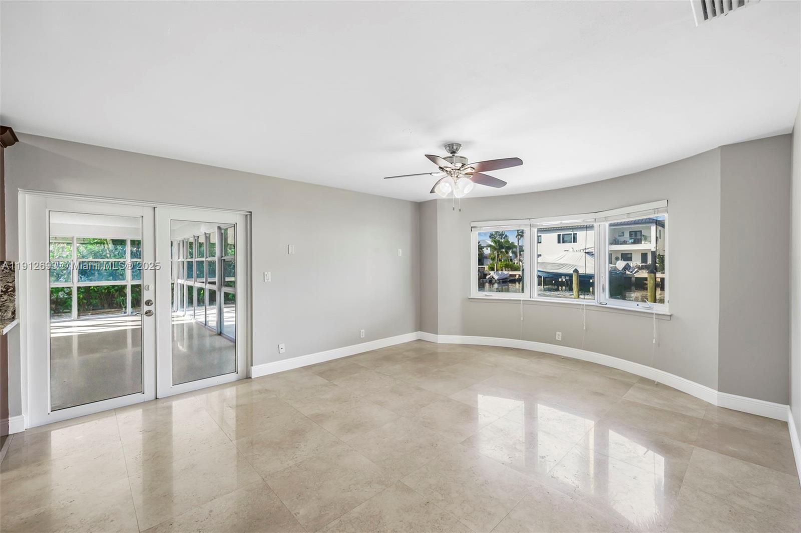 633 Solar Isle Drive Fort Lauderdale, FL 33301 - Photo 52 of 57 a view of an empty room with a window