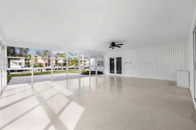 a view of a living room and chandelier