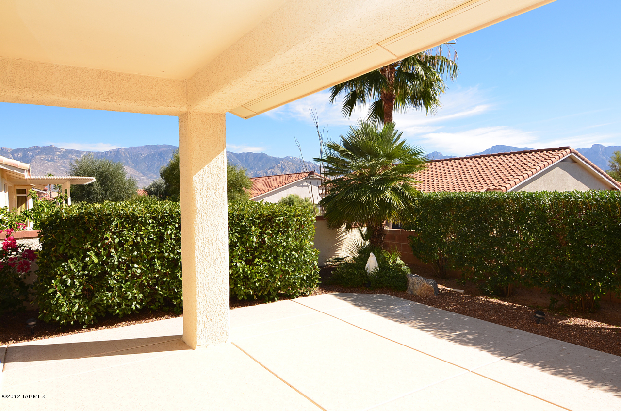 1330 East Crown Ridge Drive Tucson, AZ 85755 - Photo 17 of 22 a view of a house with a yard