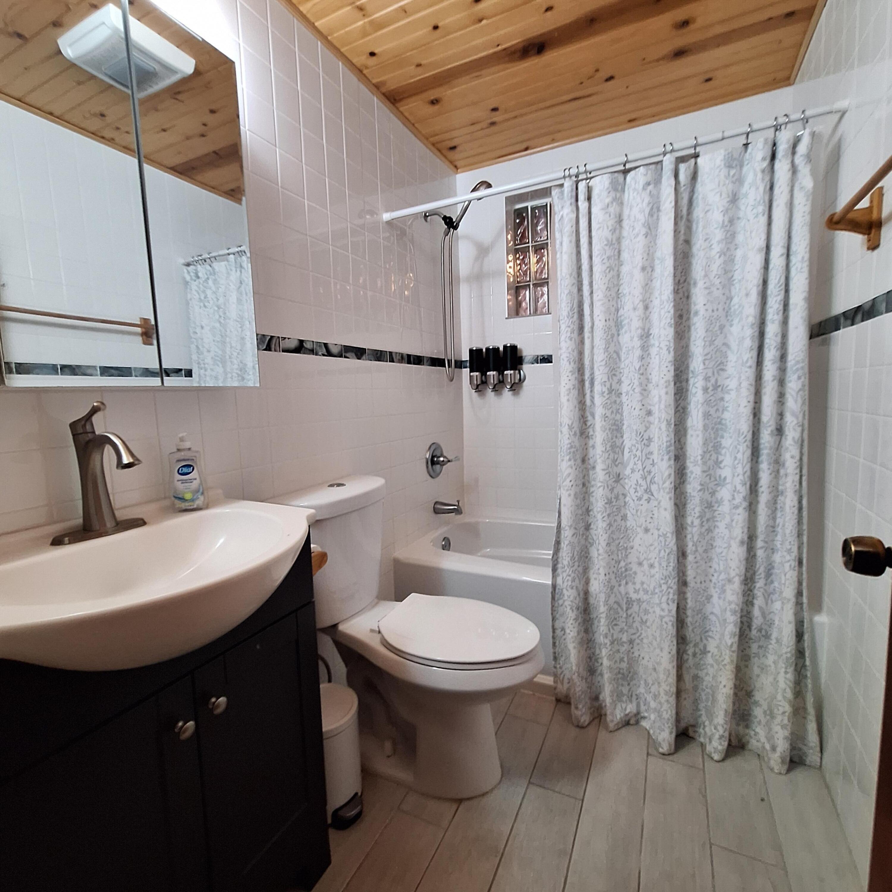 27 Pompano Avenue Key Largo, FL 33037 - Photo 12 of 25 a bathroom with a sink a toilet and shower