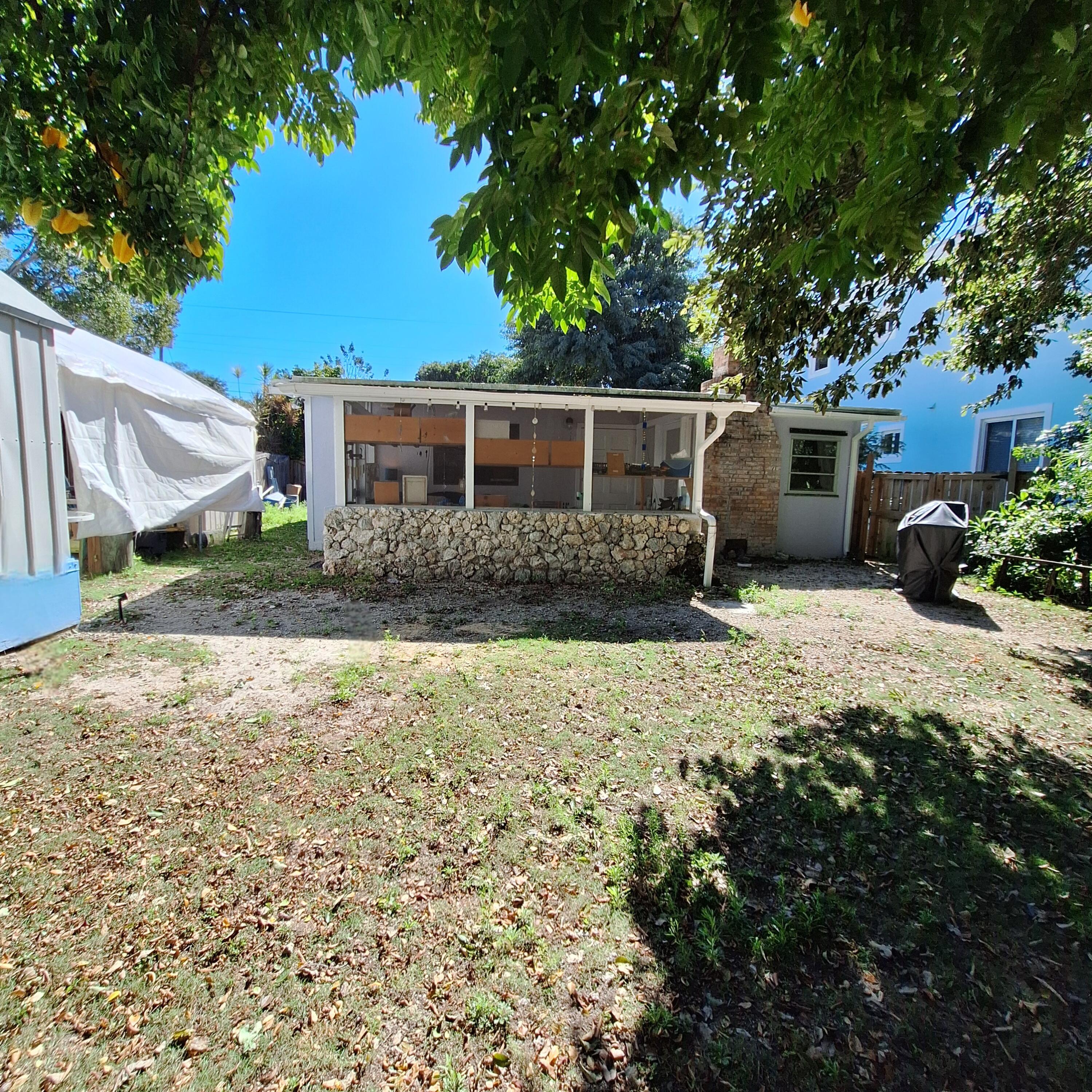 27 Pompano Avenue Key Largo, FL 33037 - Photo 16 of 25 a house view with a backyard space