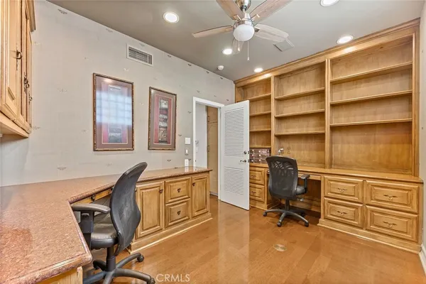 a view of a workspace with furniture