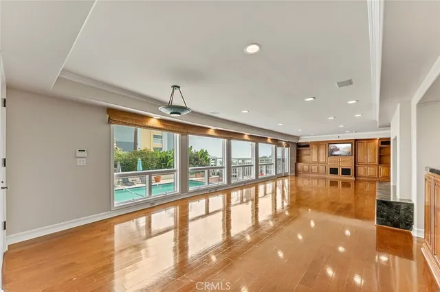 a view of an empty room with a large window