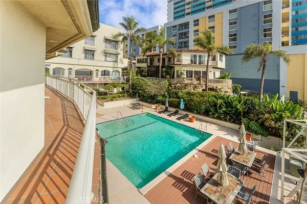 a view of an empty room and a balcony