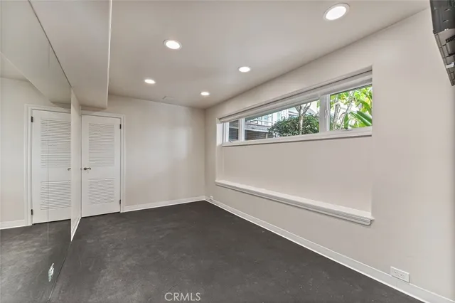 a bathroom with a tub and a sink
