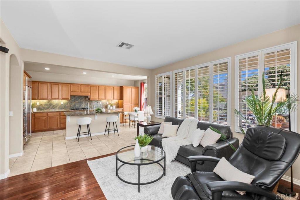 838 Luminara Way San Marcos, CA 92078 - Photo 24 of 54 a living room with furniture and a large window