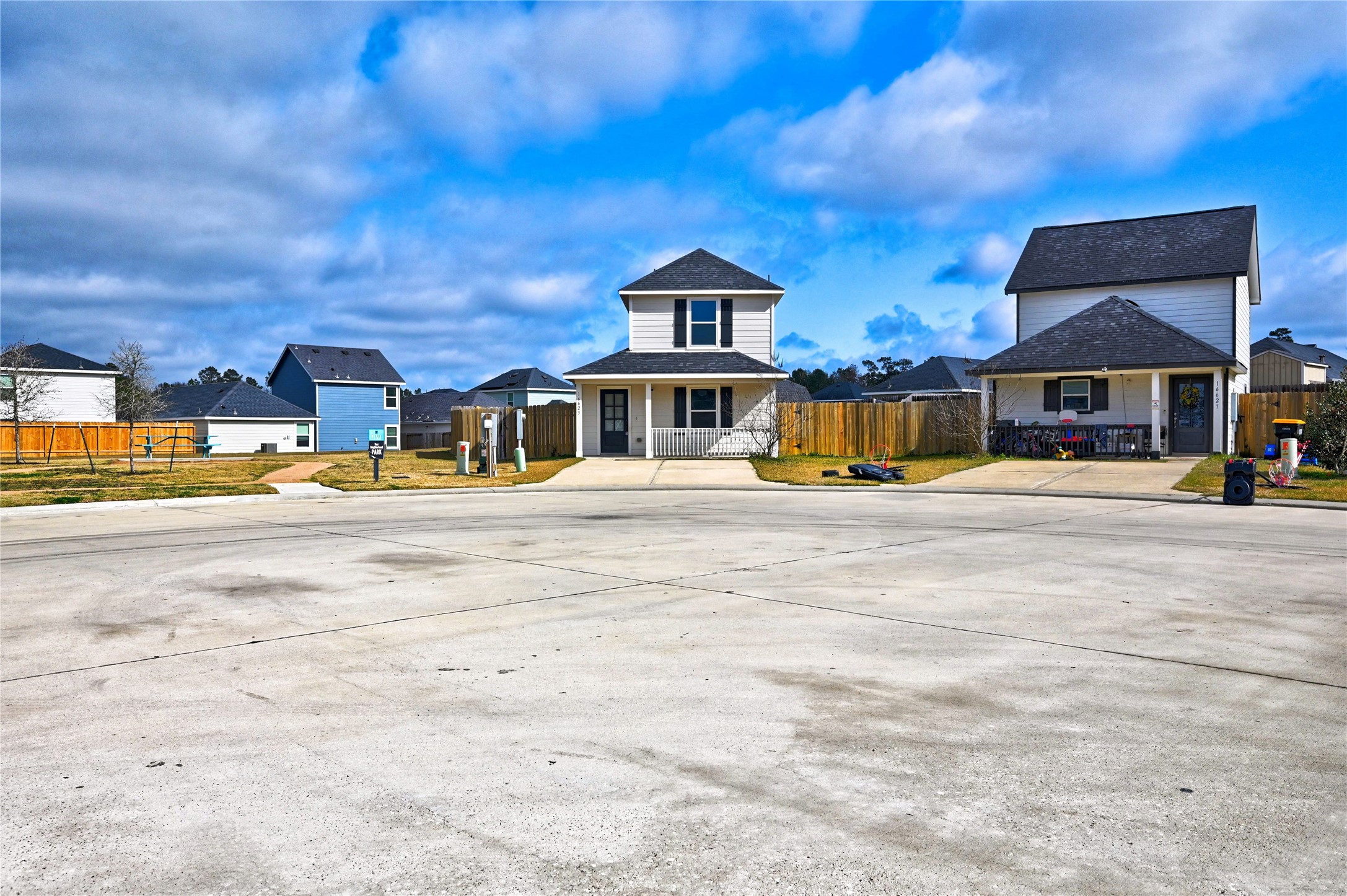 16623 Colleen Place Conroe, TX 77306 - Photo 3 of 44 a front view of a house with a yard