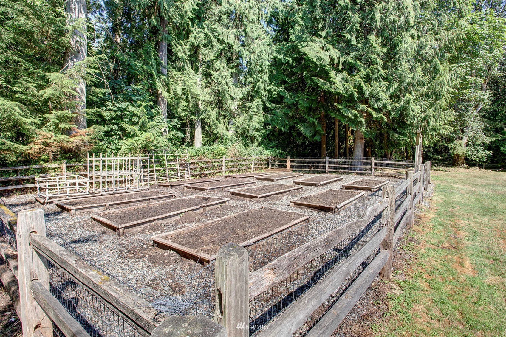 12115 Gould Road Graham, WA 98338 - Photo 30 of 37 a view of a backyard with wooden floor