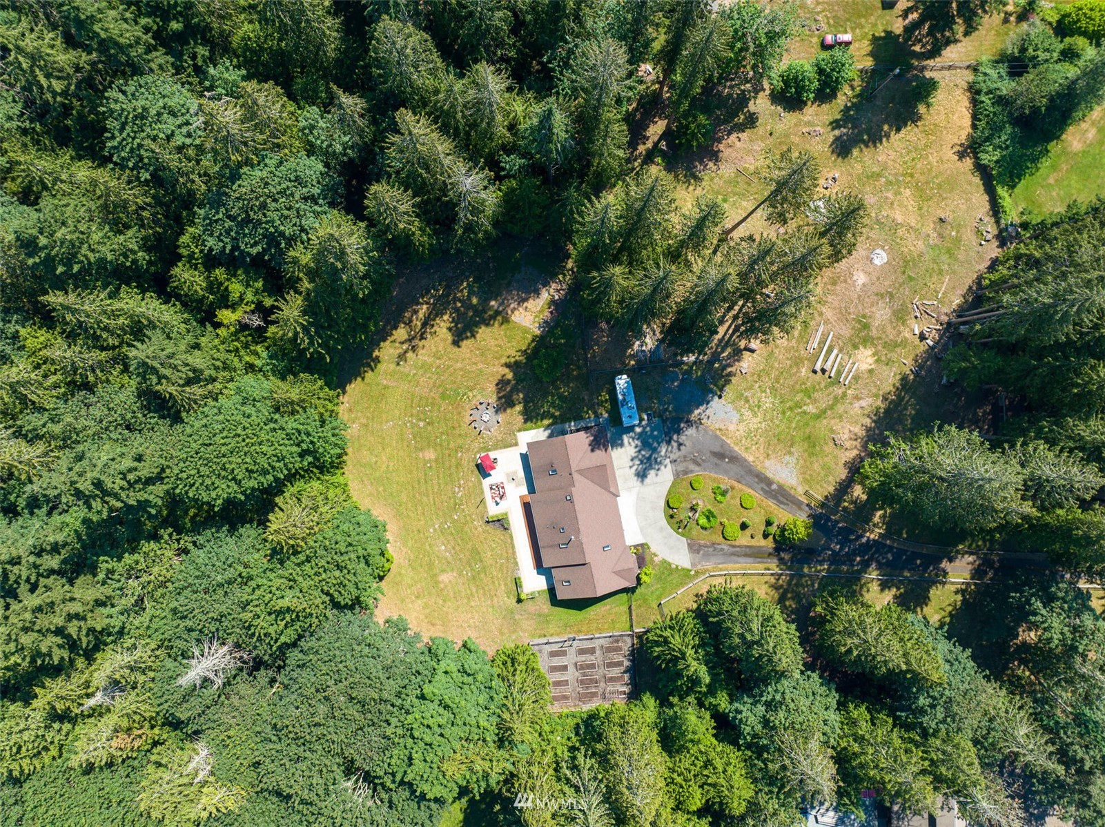 12115 Gould Road Graham, WA 98338 - Photo 6 of 37 an aerial view of residential house with outdoor space and swimming pool