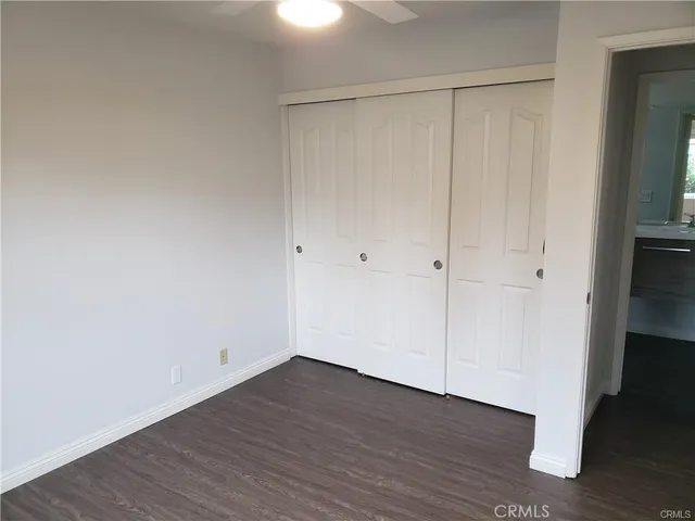 a view of a pathway with a yard