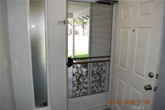 a bathroom with a shower and a window
