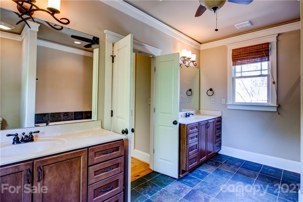 797 Shady Grove Crossing Fort Mill, SC 29708 - Photo 2 of 35 a spacious bathroom with a double vanity sink mirror and shower