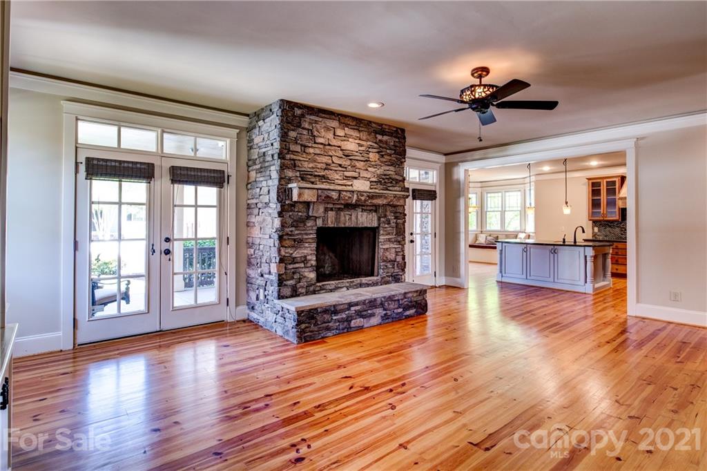797 Shady Grove Crossing Fort Mill, SC 29708 - Photo 18 of 35 a view of an empty room with wooden floor fireplace and a window