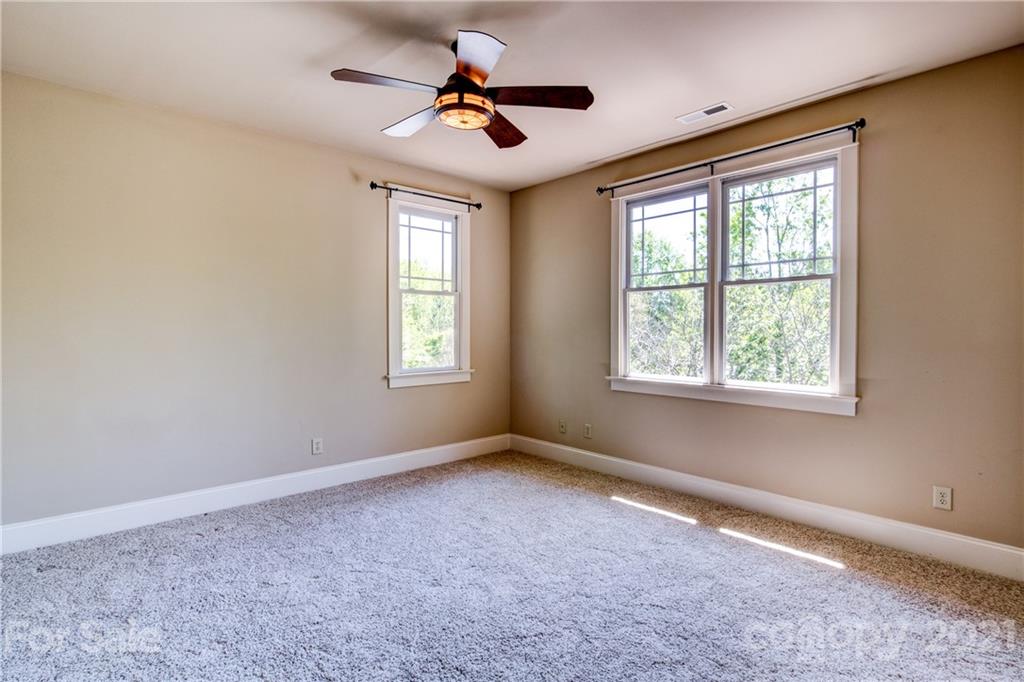 797 Shady Grove Crossing Fort Mill, SC 29708 - Photo 4 of 35 a view of room with a ceiling fan and window